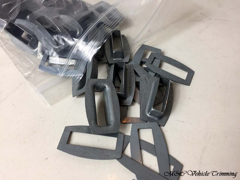 M&C Vehicle Trimming - Rectangular slotted eyelets with disc M&C Vehicle Trimming - Rectangular slotted eyelets with disc
